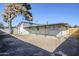 View of the house's back and the covered patio at 3021 W Ocotillo Rd, Phoenix, AZ 85017