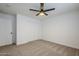 Charming bedroom with ceiling fan and double door closet at 3021 W Ocotillo Rd, Phoenix, AZ 85017