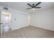 Large bedroom with ceiling fan and carpet flooring at 3021 W Ocotillo Rd, Phoenix, AZ 85017