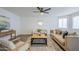 Spacious living room with neutral colored couch and wood coffee table at 3021 W Ocotillo Rd, Phoenix, AZ 85017