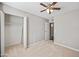 Bedroom with closet and ceiling fan at 3511 E Baseline Rd # 1147, Phoenix, AZ 85042