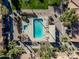 Community pool with surrounding patio furniture and hot tub at 3511 E Baseline Rd # 1147, Phoenix, AZ 85042