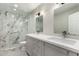 Modern bathroom with double vanity, marble shower, and toilet at 401 N 68Th Ave # 247, Phoenix, AZ 85043