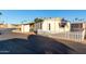 Side view of the manufactured home with fence at 401 N 68Th Ave # 247, Phoenix, AZ 85043