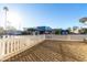 Gravel front yard with white picket fence at 401 N 68Th Ave # 247, Phoenix, AZ 85043