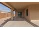 Covered patio with sliding glass door access at 40861 W Little Dr, Maricopa, AZ 85138