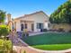 Spacious backyard with artificial turf and patio area at 4142 E Sahuaro Dr, Phoenix, AZ 85028