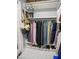 Well-organized closet with hanging rods and shelves for storage at 4142 E Sahuaro Dr, Phoenix, AZ 85028