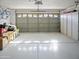 Two-car garage with built-in cabinets and epoxy floor at 4142 E Sahuaro Dr, Phoenix, AZ 85028