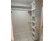 Walk-in closet with shelving and hanging rods at 4200 N Miller Rd # 112, Scottsdale, AZ 85251