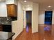 Kitchen features dark wood cabinets and granite countertops at 4200 N Miller Rd # 112, Scottsdale, AZ 85251