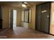 Sunroom with tile flooring, sliding doors, and a ceiling fan at 4200 N Miller Rd # 112, Scottsdale, AZ 85251