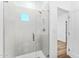 Modern shower with glass enclosure and marble-like wall tile at 4220 N 32Nd St # 32, Phoenix, AZ 85018