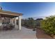 Covered patio with table and chairs, desert view at 4332 S Primrose Dr, Gold Canyon, AZ 85118