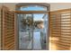 View of backyard and mountain landscape from interior French doors at 4332 S Primrose Dr, Gold Canyon, AZ 85118