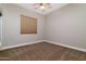 Simple bedroom with carpeted floor and window coverings at 4332 S Primrose Dr, Gold Canyon, AZ 85118