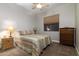 Cozy bedroom with a ceiling fan and wood dresser at 4332 S Primrose Dr, Gold Canyon, AZ 85118