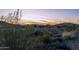 View of homes and desert landscape at sunset at 4332 S Primrose Dr, Gold Canyon, AZ 85118