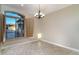 Formal dining room with large window and plantation shutters at 4332 S Primrose Dr, Gold Canyon, AZ 85118