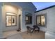 Entryway with two wicker chairs and view into the home at 4332 S Primrose Dr, Gold Canyon, AZ 85118