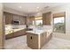 Spacious kitchen with island and wood cabinets at 4332 S Primrose Dr, Gold Canyon, AZ 85118