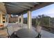 Outdoor dining area on a covered patio at 4332 S Primrose Dr, Gold Canyon, AZ 85118