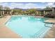 Community pool with mountain views and lounge chairs at 4332 S Primrose Dr, Gold Canyon, AZ 85118