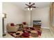 Cozy sitting area with two armchairs, a rug, and a TV at 4332 S Primrose Dr, Gold Canyon, AZ 85118