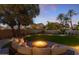 Peaceful backyard with fire pit and mountain views at 4450 E Camelback Rd # 4, Phoenix, AZ 85018