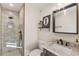 Modern bathroom with walk-in shower and granite vanity at 4450 E Camelback Rd # 4, Phoenix, AZ 85018