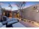 Private courtyard with seating area and outdoor lighting at 4450 E Camelback Rd # 4, Phoenix, AZ 85018