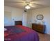 Bright bedroom featuring a king-size bed and ample space at 5110 E Edgewood Ave, Mesa, AZ 85206