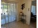 Dining area with sliding door to patio and wine rack at 5110 E Edgewood Ave, Mesa, AZ 85206