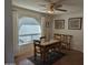 Charming dining room with wood table and four chairs at 5110 E Edgewood Ave, Mesa, AZ 85206