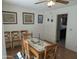 Dining room with table, chairs, and kitchen access at 5110 E Edgewood Ave, Mesa, AZ 85206