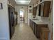 Kitchen with tile floor and view to dining area at 5110 E Edgewood Ave, Mesa, AZ 85206