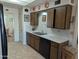 Kitchen with double sink and dishwasher at 5110 E Edgewood Ave, Mesa, AZ 85206