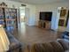 Spacious living room with hardwood floors and ample natural light at 5110 E Edgewood Ave, Mesa, AZ 85206