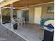 Covered patio with seating area and ceiling fan at 5110 E Edgewood Ave, Mesa, AZ 85206