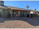 Patio with seating, grill, and access to the house at 5110 E Edgewood Ave, Mesa, AZ 85206