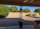 Covered patio with seating area and sun decor at 5110 E Edgewood Ave, Mesa, AZ 85206