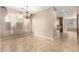 Elegant dining room with tile floors and chandelier at 5331 E Holmes Ave, Mesa, AZ 85206