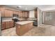 Kitchen with island and stainless steel appliances at 5331 E Holmes Ave, Mesa, AZ 85206