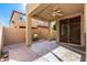 Covered patio with ceiling fan and decorative lighting at 5331 E Holmes Ave, Mesa, AZ 85206