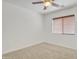 Well-lit bedroom featuring a ceiling fan and window at 544 N Alma School Rd # 9, Mesa, AZ 85201