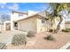 Two-story house with a garage and desert landscaping at 544 N Alma School Rd # 9, Mesa, AZ 85201