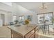 Kitchen island with seating and a bowl of lemons as a centerpiece at 544 N Alma School Rd # 9, Mesa, AZ 85201