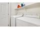 Laundry room with washer, dryer, and shelving at 544 N Alma School Rd # 9, Mesa, AZ 85201