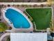 Stunning aerial view of the pool and putting green enhancing the home's outdoor entertainment area at 6320 E Kings Ave, Scottsdale, AZ 85254