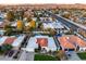 Aerial view of the home in a neighborhood with a large pool, mature landscaping, and backyard at 6320 E Kings Ave, Scottsdale, AZ 85254